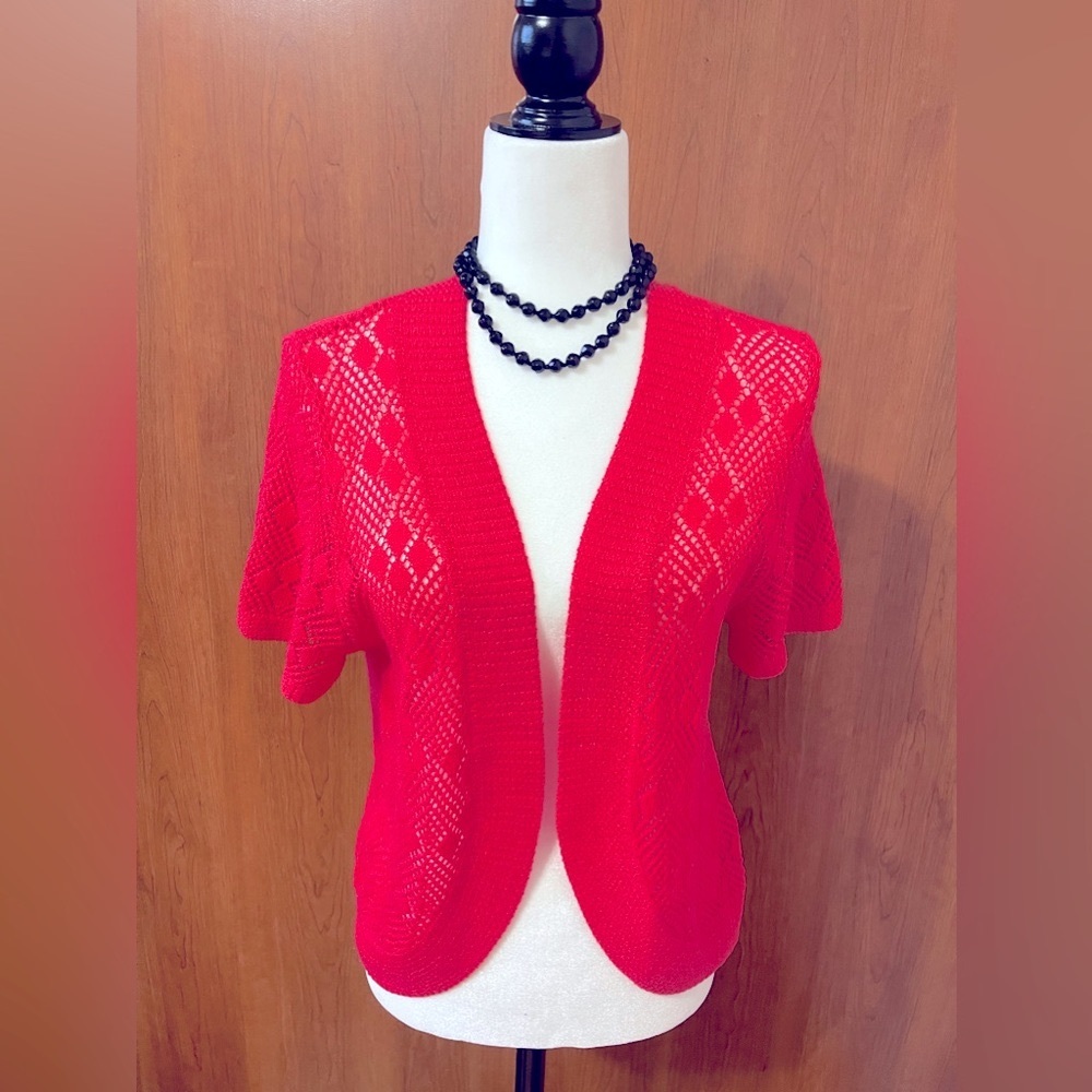 Bella, knitted / bolero / cardigan. In excellent condition, salmon pink color